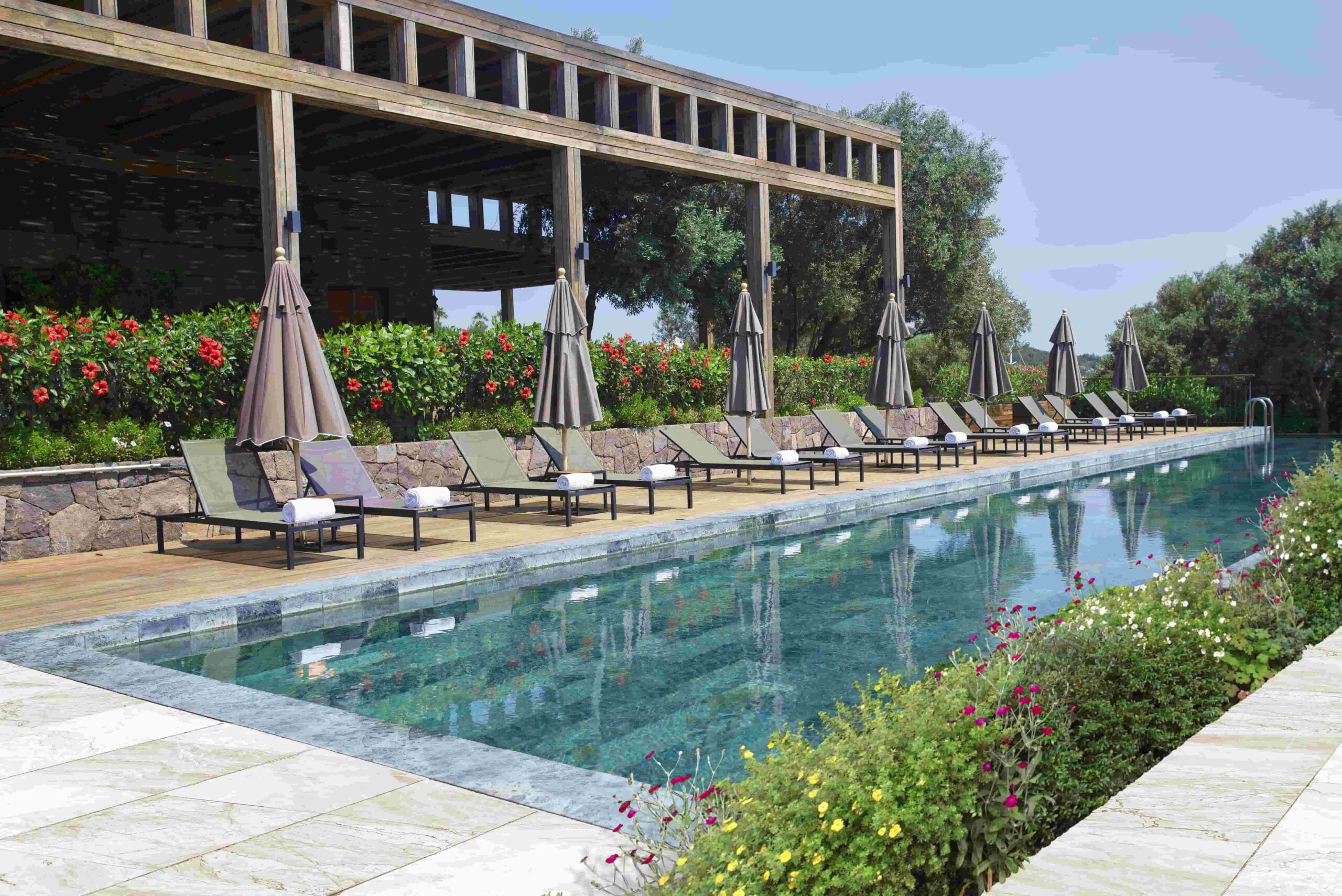 Swimming pool flooring: create stunning, multipurpose spaces with movable pool floors 4 movable floor hotel scaled 1